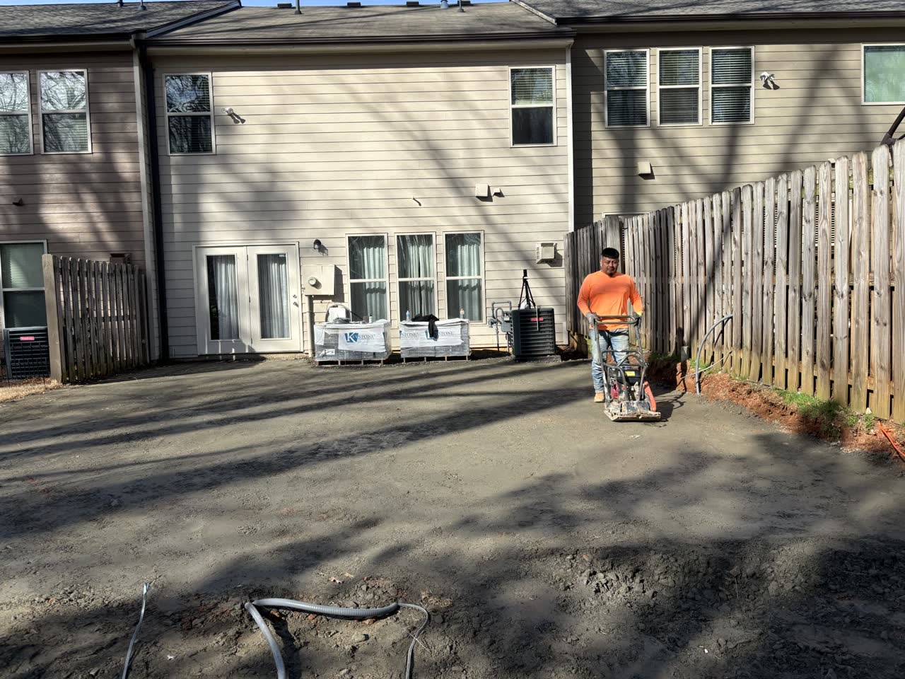 Compacting the crushed-stone base