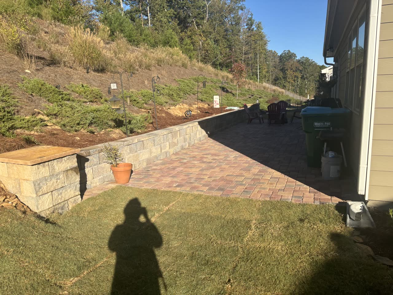 Crew building a block retaining wall